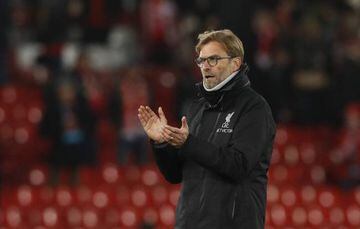 Liverpool manager Juergen Klopp applauds the fans.