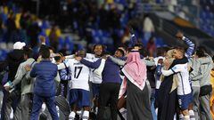 Hilal's players celebrate their victory in the FIFA Club World Cup semi-final football match between Brazil's Flamengo and Saudi Arabia's Al-Hilal at the Ibn Batouta Stadium in Tangier on February 7, 2023. (Photo by Fadel Senna / AFP)