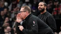 Apr 7, 2022; Toronto, Ontario, CAN; Toronto Raptors head coach Nick Nurse (front) calls out his team as recording artist Drake (rear) looks on during the first half against the Philadelphia 76ers at Scotiabank Arena. Mandatory Credit: John E. Sokolowski-USA TODAY Sports
