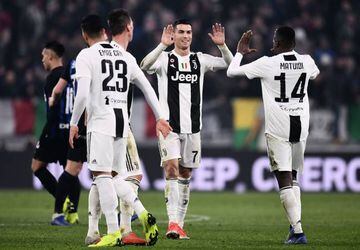 Family man | Juventus' Portuguese forward Cristiano Ronaldo (C) celebrates with teammates.