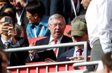 Sir Alex Ferguson watching the action at Anfield