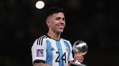 LUSAIL CITY, QATAR - DECEMBER 18: Enzo Fernandez of Argentina poses with the FIFA Young Player award trophy at the award ceremony following the FIFA World Cup Qatar 2022 Final match between Argentina and France at Lusail Stadium on December 18, 2022 in Lusail City, Qatar. (Photo by Clive Brunskill/Getty Images)