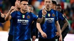Lautaro Martinez and Ivan Perisic celebrate after Inter beat Udinese at the Friuli stadium.