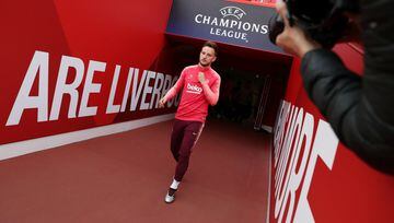 Ivan Rakitic comes out for Barcelona's training session at Anfield