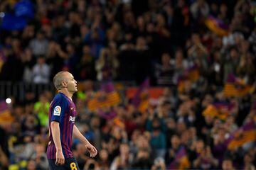 Andres Iniesta walks off the pitch. Iniesta, who joined Barcelona's academy 22 years ago, played his final game for the club.