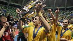 Falcao of Brazil holds their trophy after winning the FIFA Futsal World Cup soccer match against Spain at the Gimnasio Maracanazinho in Rio de Janeiro October 19, 2008. REUTERS/Bruno Domingos (BRAZIL)