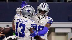 ARLINGTON, TEXAS - DECEMBER 24: Michael Gallup #13 of the Dallas Cowboys celebrates a touchdown with CeeDee Lamb #88 during the third quarter in the game against the Philadelphia Eagles at AT&T Stadium on December 24, 2022 in Arlington, Texas.   Sam Hodde/Getty Images/AFP (Photo by Sam Hodde / GETTY IMAGES NORTH AMERICA / Getty Images via AFP)