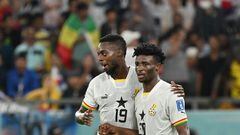 Ghana's midfielder #20 Mohammed Kudus (R) celebrates scoring his team's third goal with Ghana's forward #19 Inaki Williams during the Qatar 2022 World Cup Group H football match between South Korea and Ghana at the Education City Stadium in Al-Rayyan, west of Doha, on November 28, 2022. (Photo by JUNG Yeon-je / AFP)