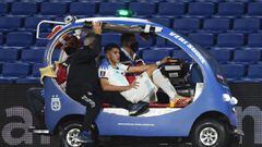 Argentina&#039;s Exequiel Palacios is taken out of the field in a cart after getting injured   during the closed-door 2022 FIFA World Cup South American qualifier football match against Paraguay at La Bombonera Stadium in Buenos Aires on November 12, 2020. (Photo by Marcelo ENDELLI / POOL / AFP)
