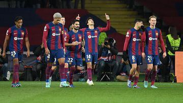 Barcelona's Portuguese forward #14 Joao Felix celebrates with teammates after scoring his team's second goal during the UEFA Champions League first round group H football match between FC Barcelona and FC Porto at the Estadi Olimpic Lluis Companys in Barcelona on November 28, 2023. (Photo by Josep LAGO / AFP)