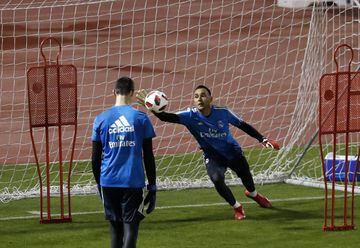 Keylor Navas having a stretch as the keepers are worked out.