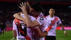 BUENOS AIRES, ARGENTINA - OCTOBER 01: Rafael Santos Borre of River Plate celebrates with teammate Ignacio Fernandez after scoring the opening goal via penalty after a VAR review during the semi final first leg match between River Plate and Boca Juniors as
