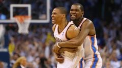 Russell Westbrook #0 and Kevin Durant celebrate a 105-104 win against the Los Angeles Clippers in Game Five of the Western Conference Semifinals