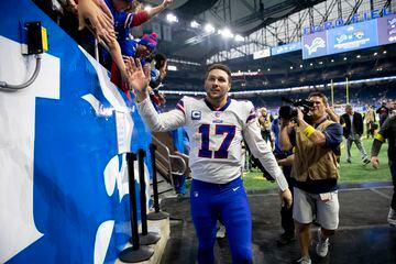 Nov 24, 2022; Detroit, Michigan, USA;  Buffalo Bills quarterback Josh Allen (17) celebrates with fans as he walks off the field after the Bills beat the Detroit Lions at Ford Field. Mandatory Credit: Lon Horwedel-USA TODAY Sports