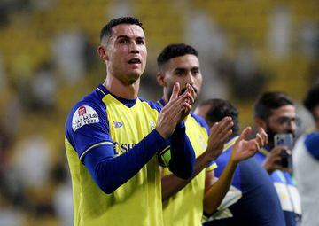 Al Nassr's Cristiano Ronaldo applauds fans after a match.