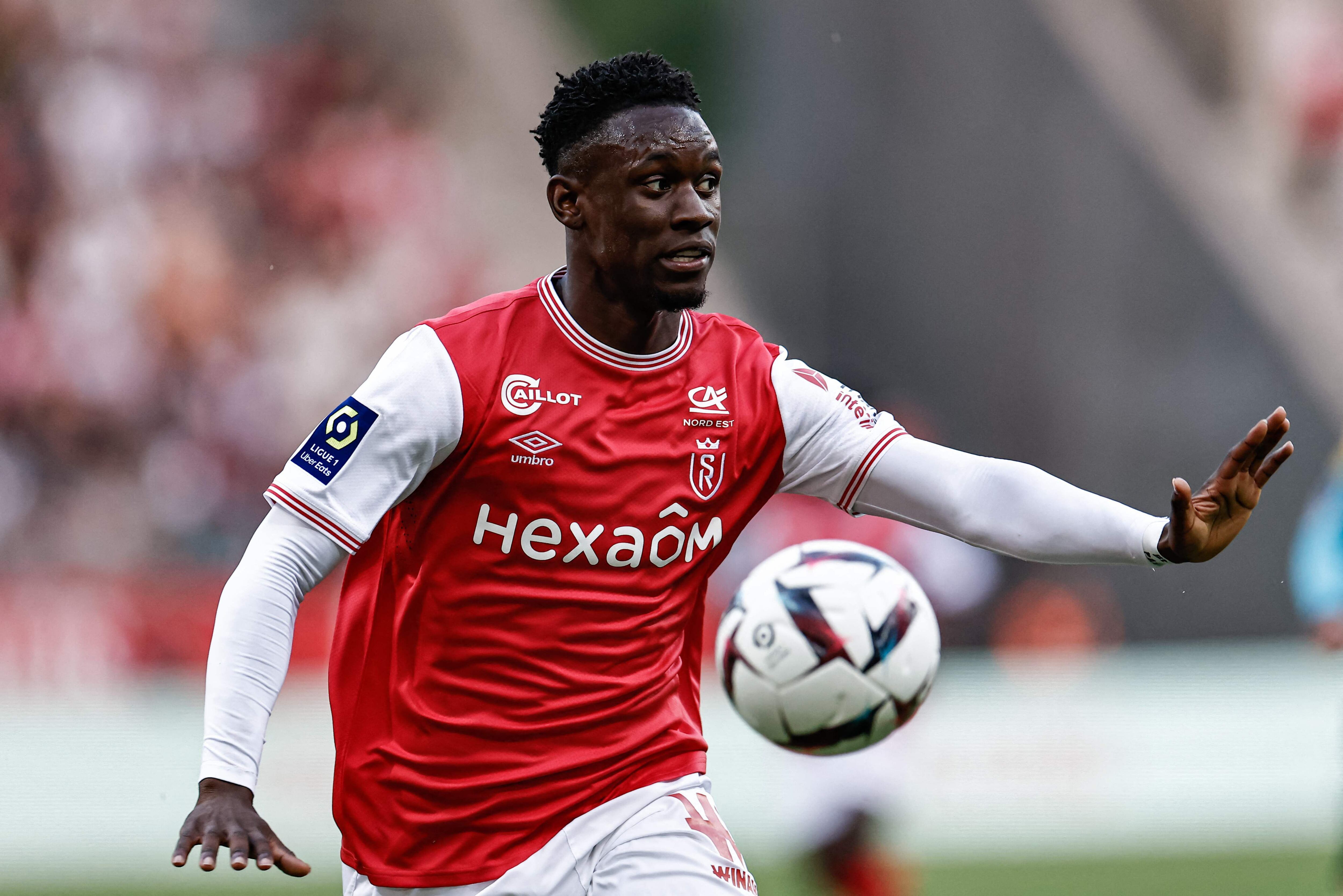 Reims' English forward Folarin Balogun controls the ball during the French L1 football match between Stade de Reims and Montpellier Herault SC at Stade Auguste-Delaune in Reims, northern France on June 3, 2023. (Photo by Sameer Al-DOUMY / AFP)