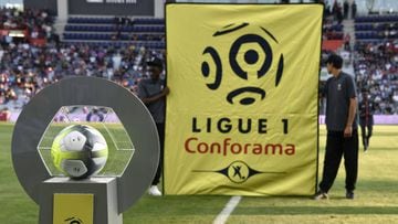 (FILES) In this file photo taken on August 12, 2017 the new sponsor logo &quot;Ligue 1 - Conforama&quot; is installed next to the new official ball, prior to the French Ligue 1 football match between Toulouse and Montpellier at the Municipal Stadium in To