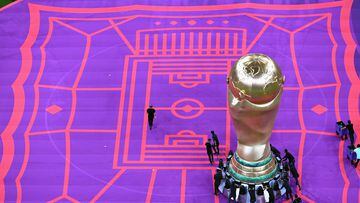 A replica of the World Cup trophy is displayed ahead of the start of the Qatar 2022 World Cup Group E football match between Costa Rica and Germany at the Al-Bayt Stadium in Al Khor, north of Doha on December 1, 2022. (Photo by Kirill KUDRYAVTSEV / AFP)