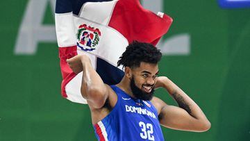 Dominican Republic's Karl-Anthony Towns celebrates victory after the FIBA Basketball World Cup group A match between Angola and Dominican Republic at Smart Araneta Coliseum in Quezon City, suburban Manila on August 29, 2023. (Photo by SHERWIN VARDELEON / AFP)