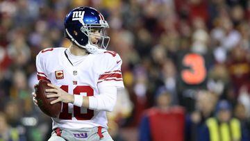LANDOVER, MD - JANUARY 01: Quarterback Eli Manning #10 of the New York Giants passes the ball against the Washington Redskins in the fourth quarter at FedExField on January 1, 2017 in Landover, Maryland.   Rob Carr/Getty Images/AFP == FOR NEWSPAPERS, INTERNET, TELCOS &amp; TELEVISION USE ONLY ==