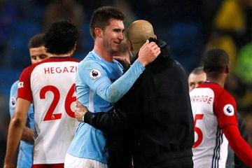 New boy | Manchester City manager Pep Guardiola celebrates with Aymeric Laporte after defender's debut against West Brom.