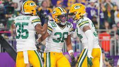 Green Bay Packers safety Anthony Johnson Jr. (36) celebrates a turnover on downs with cornerback Corey Ballentine (35) and safety Jonathan Owens (34)
