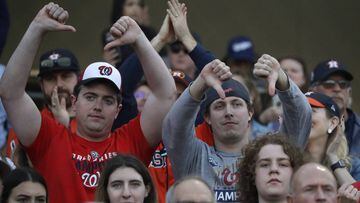 Fans reacts as the Houston Astros are introduced before facing the Washington Nationals in spring training baseball game Saturday, Feb. 22, 2020, in West Palm Beach, Fla. (AP Photo/John Bazemore)