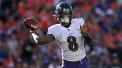 Lamar Jackson of the Baltimore Ravens passes in the third quarter of the game against the Denver Broncos. 