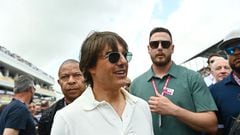 Tom Cruise was right in there with the Mercedes team as he helped the pit crew change out the tires of Lewis Hamilton.