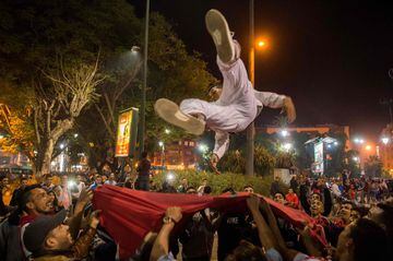 Locals celebrate in Marrakech after Morocco's victory over Ivory Coast in their FIFA 2018 World Cup Play-Off.