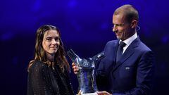MONACO, MONACO - AUGUST 31: UEFA President Aleksander Ceferin gives theUEFA Women’s Player of the Year award toAitana Bonmati of FC Barcelona during the UEFA Champions League 2023/24 Group Stage Draw at Grimaldi Forum on August 31, 2023 in Monaco, Monaco. (Photo by Valerio Pennicino - UEFA/UEFA via Getty Images)