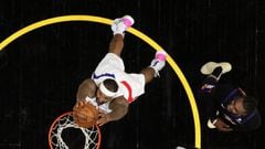 PHOENIX, ARIZONA - JUNE 28: DeMarcus Cousins #15 of the LA Clippers slam dunks ahead of Jae Crowder #99 of the Phoenix Suns during the first half of game five of the Western Conference Finals at Phoenix Suns Arena on June 28, 2021 in Phoenix, Arizona. The