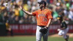 Houston Astros pitcher Justin Verlander gets a new ball after giving up a two-run home run to Oakland Athletics&#039; Khris Davis, right, in the third inning of a baseball game Sunday, Aug. 19, 2018, in Oakland, Calif. (AP Photo/Ben Margot)