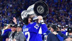 TAMPA, FLORIDA - JULY 07: Alex Killorn #17 of the Tampa Bay Lightning hoists the Stanley Cup after defeating the Montreal Canadiens 1-0 in Game Five to win the 2021 NHL Stanley Cup Final at Amalie Arena on July 07, 2021 in Tampa, Florida.   Julio Aguilar/