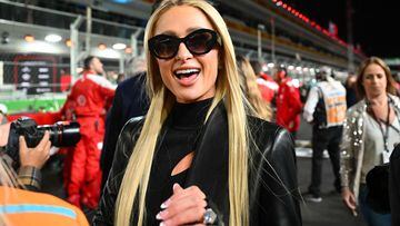 US media personality and businesswoman Paris Hilton tours the grid before the start of the Las Vegas Formula One Grand Prix on November 18, 2023, in Las Vegas, Nevada. (Photo by ANGELA WEISS / AFP)