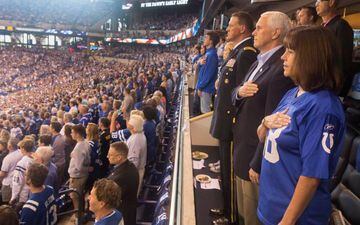 Vice President Mike Pence and Second Lady Karen Pence stand during the national anthem prior to the start of an NFL football game between the Indiana Colts and the San Francisco 49ers at the Lucas Oil Stadium, before walking out in a premeditated protest 