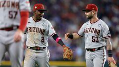 ARLINGTON, TEXAS - OCTOBER 28: Geraldo Perdomo #2 and Christian Walker #53 of the Arizona Diamondbacks walk across the field after the eighth inning against the Texas Rangers during Game Two of the World Series at Globe Life Field on October 28, 2023 in Arlington, Texas.   Carmen Mandato/Getty Images/AFP (Photo by Carmen Mandato / GETTY IMAGES NORTH AMERICA / Getty Images via AFP)