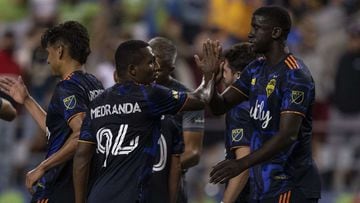 SEATTLE, WA - AUGUST 10: Seattle Sounders FC including Jimmy Medranda #94 and Abdoulaye Cissoko #92 celebrate after a match against Tigres UANLat Lumen Field on August 10, 2021 in Seattle, Washington. Sounders FC won 3-0.   Stephen Brashear/Getty Images/A