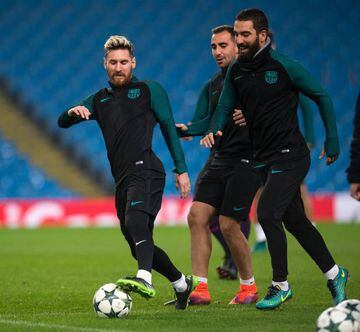 Leo Messi and Arda Turan in Barcelona's training session at the Etihad