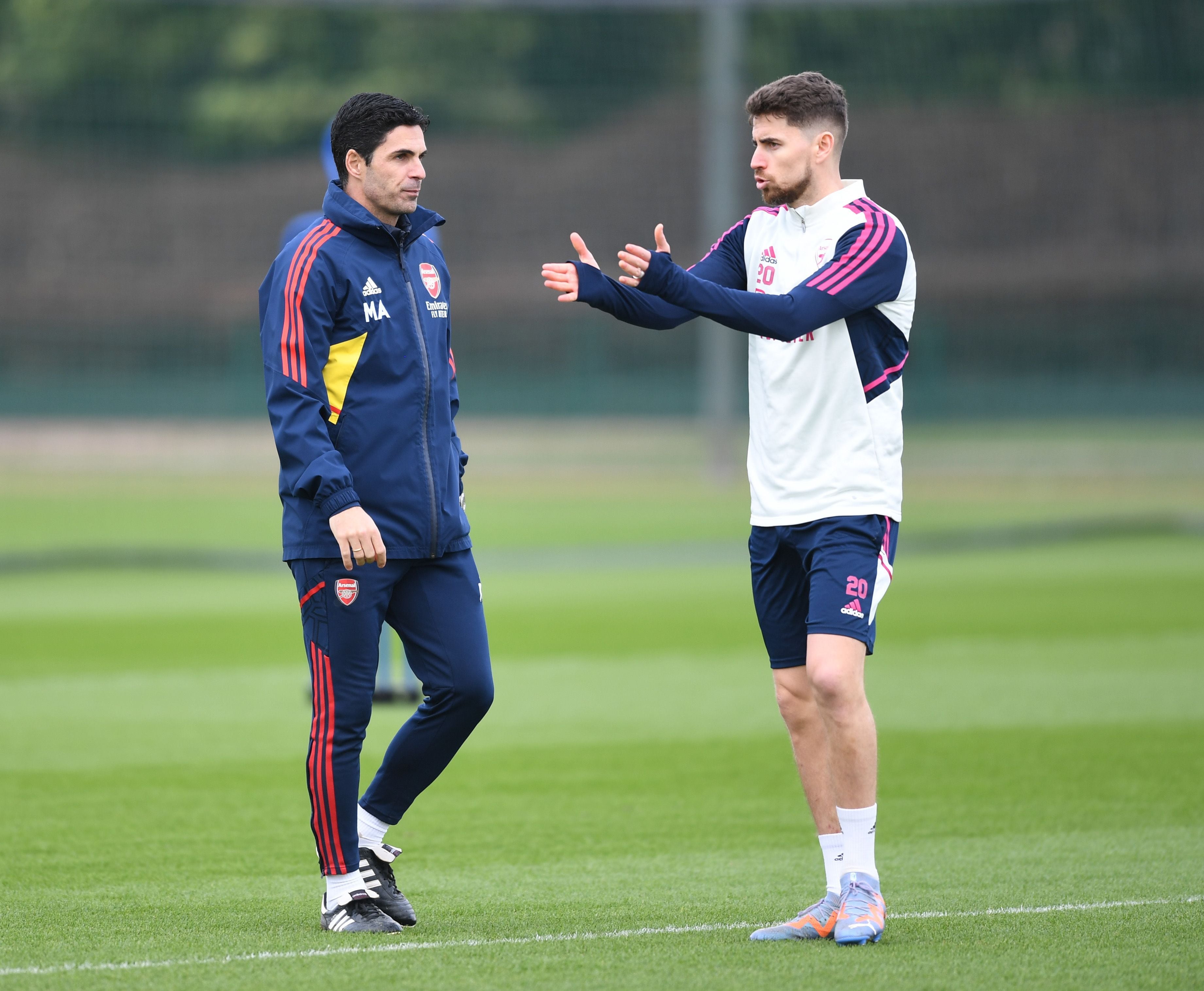 ST ALBANS, ENGLAND - FEBRUARY 17: Arsenal manager Mikel Arteta talks to Jorginho during a training session at London Colney on February 17, 2023 in St Albans, England. (Photo by Stuart MacFarlane/Arsenal FC via Getty Images)