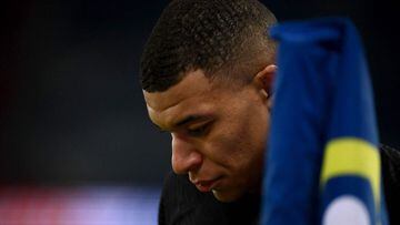 Paris Saint-Germain&#039;s French forward Kylian Mbappe looks on during the French L1 football match between Paris Saint-Germain (PSG) and Reims at the Parc des Princes stadium in Paris on January 23, 2022. (Photo by Franck FIFE / AFP)