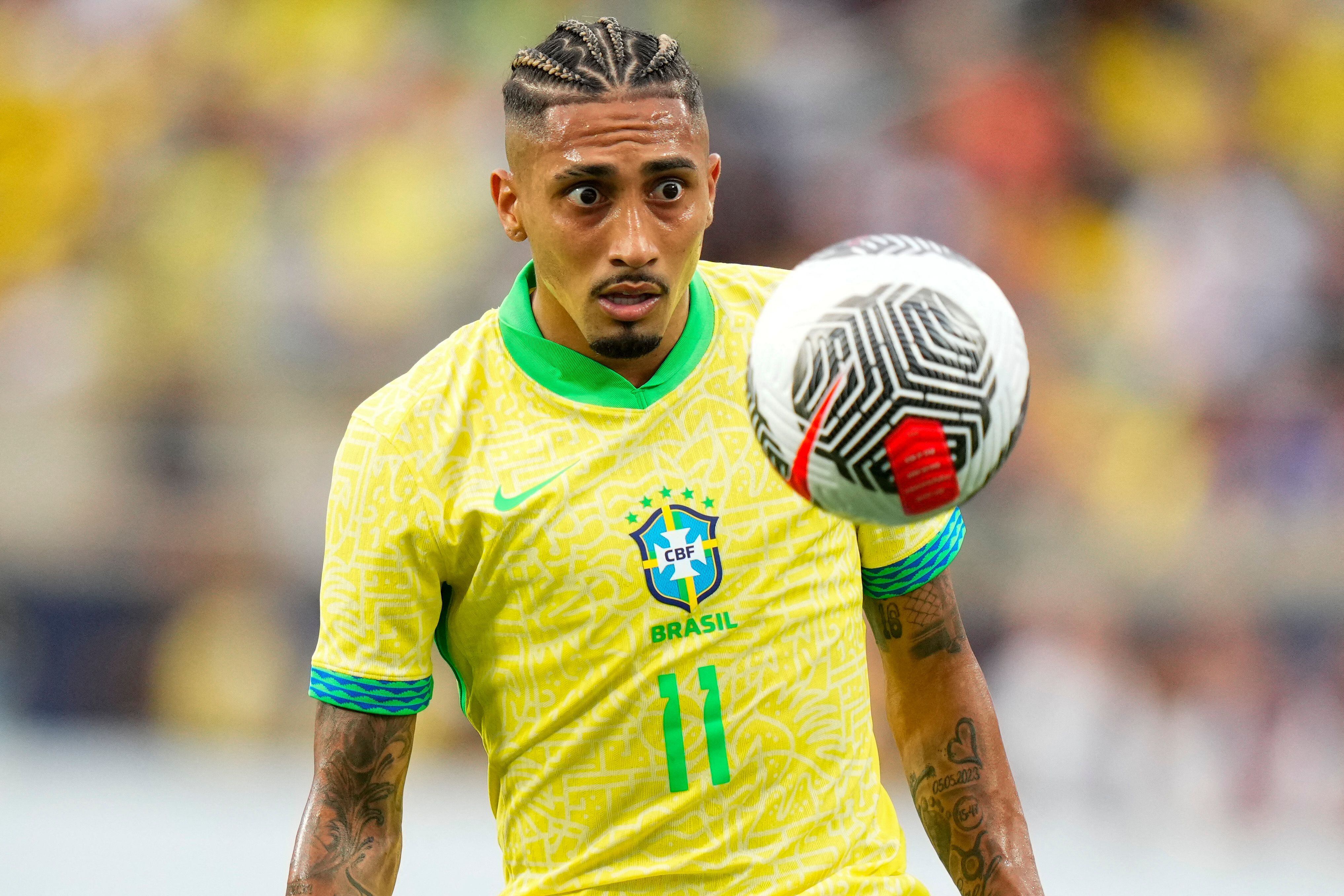 ORLANDO, FLORIDA - JUNE 12: Raphinha #11 of Brazil controls the ball /U during the Continental Clasico 2024 game at Camping World Stadium on June 12, 2024 in Orlando, Florida.  Rich Storry/Getty Images/AFP (Photo by Rich Storry / GETTY IMAGES NORTH AMERICA / Getty Images via AFP)