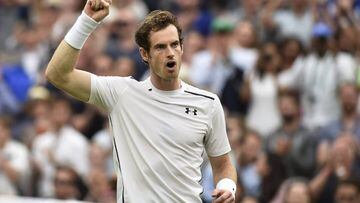 Andy Murray of Britain celebrates his win over John Millman of Australia in their third round match during the Wimbledon Championships 
