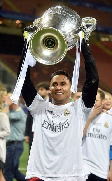 Keylor Navas celebrates with the Champions League trophy but will not be challenging for the Copa América this summer.