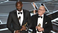 Kobe Bryant, left, and Glen Keane accept the award for best animated short for &quot;Dear Basketball&quot; at the Oscars on Sunday, March 4, 2018, at the Dolby Theatre in Los Angeles. 