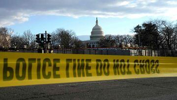 Police tape outside the US Capitol as is prepared for the inauguration ceremonies for President-elect Joe Biden and Vice President-elect Kamala Harris on January 18, 2021 in Washington, DC. - President-elect Joe Biden and Vice President-elect Kamala Harri