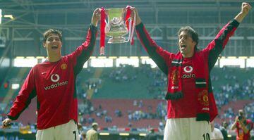 Cardiff memories | Manchester United's goalscorers Cristiano Ronaldo and Ruud van Nistelrooy hold the FA Cup.