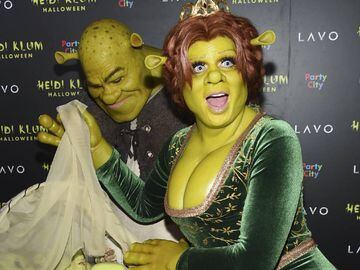 Model and television personality Heidi Klum, right, and boyfriend Tom Kaulitz dressed as Shrek and Princess Fiona arrive at her 19th annual Halloween party at Lavo New York on Wednesday, Oct. 31, 2018, in New York.  *** Local Caption *** .