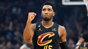 CLEVELAND, OHIO - NOVEMBER 02: Donovan Mitchell #45 of the Cleveland Cavaliers celebrates after the Cleveland Cavaliers scored during the first quarter against the Boston Celtics at Rocket Mortgage Fieldhouse on November 02, 2022 in Cleveland, Ohio. NOTE TO USER: User expressly acknowledges and agrees that, by downloading and or using this photograph, User is consenting to the terms and conditions of the Getty Images License Agreement.   Jason Miller/Getty Images/AFP