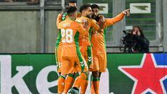 Real Betis' French midfielder Nabil Fekir (R) celebrates with teammates after scoring his team's first goal during the UEFA Europa League Group C football match between Ludogorets Razgrad (BUL) and  Real Betis (ESP) at The Ludogorets Arena in Razgrad on October 27, 2022. (Photo by Anton Uzunov / AFP)